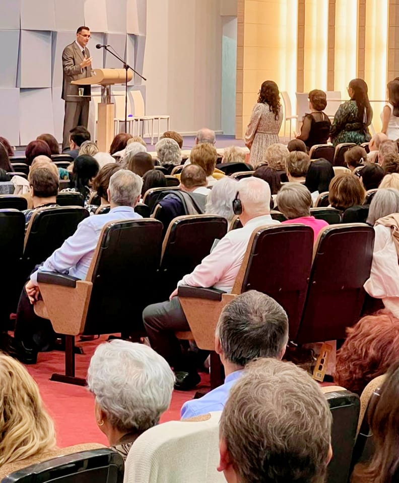 Jehovah's Witnesses volunteer distributing Bible literature